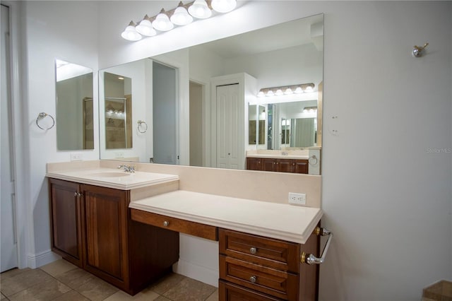 bathroom featuring tile floors and oversized vanity