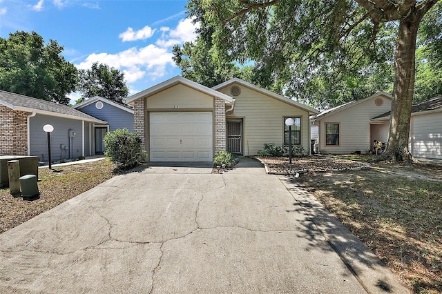 ranch-style home with a garage