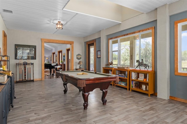 recreation room with pool table and hardwood / wood-style flooring