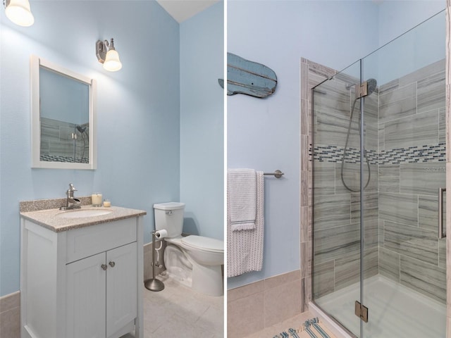 bathroom with walk in shower, vanity, and toilet