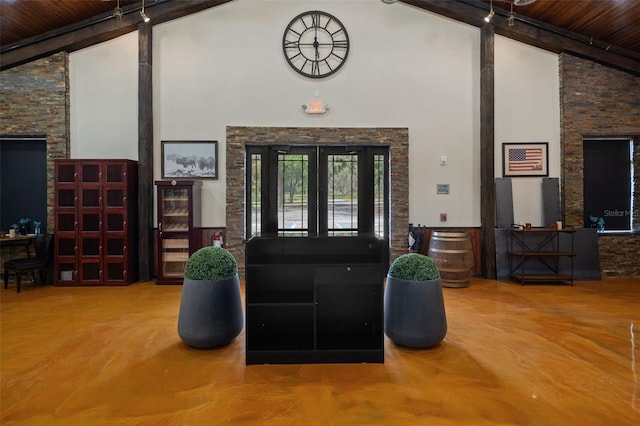 interior space with high vaulted ceiling, beam ceiling, and wood ceiling