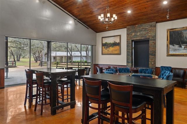 dining room featuring high vaulted ceiling, wooden ceiling, and an inviting chandelier