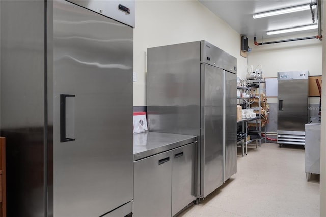 kitchen featuring stainless steel refrigerator, stainless steel fridge, and high end fridge