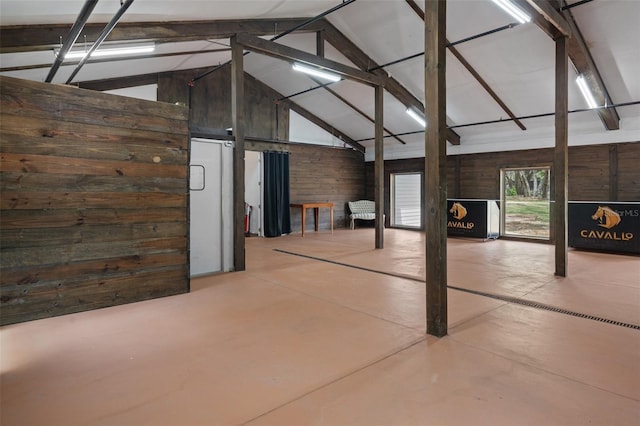 interior space featuring wood walls