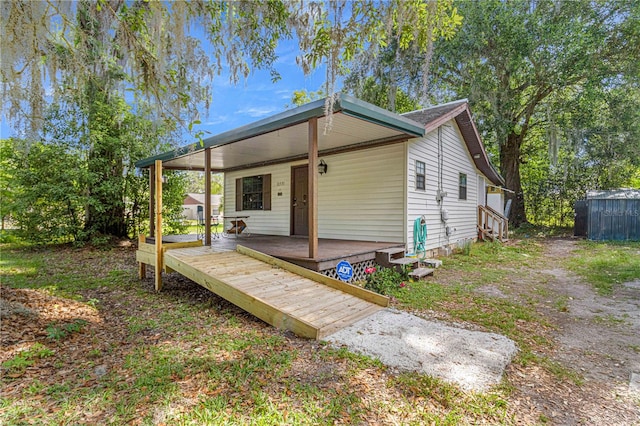 exterior space with a wooden deck