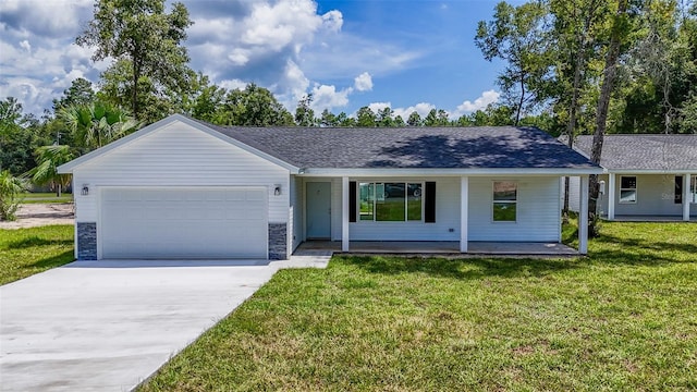 single story home with a shingled roof, concrete driveway, an attached garage, stone siding, and a front lawn