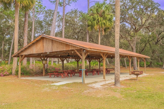 view of home's community with a lawn and a gazebo