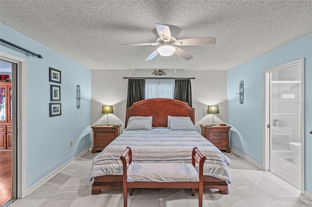 bedroom with connected bathroom, ceiling fan, and a textured ceiling