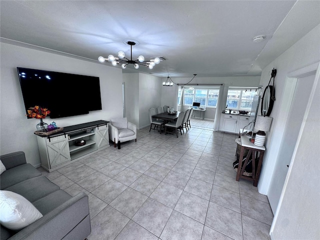 tiled living room with a chandelier