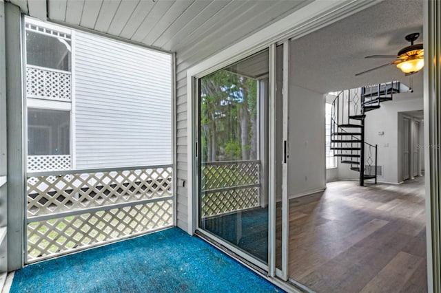 entryway featuring hardwood / wood-style floors and ceiling fan