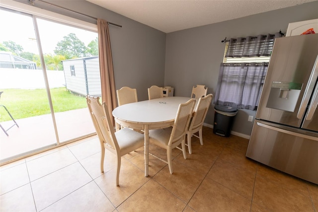 view of tiled dining space