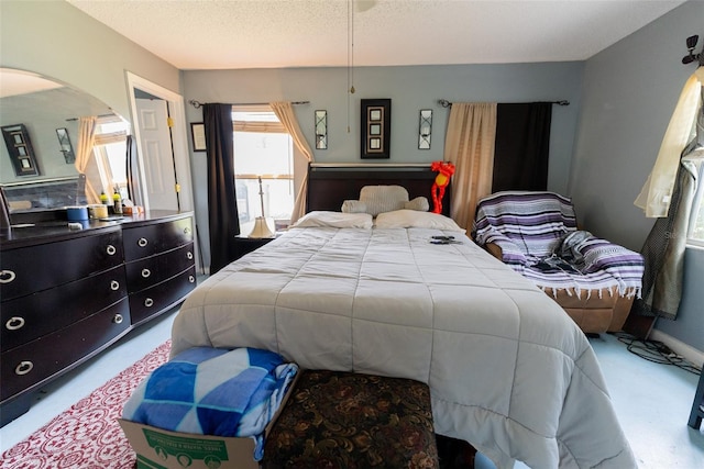 bedroom featuring a textured ceiling