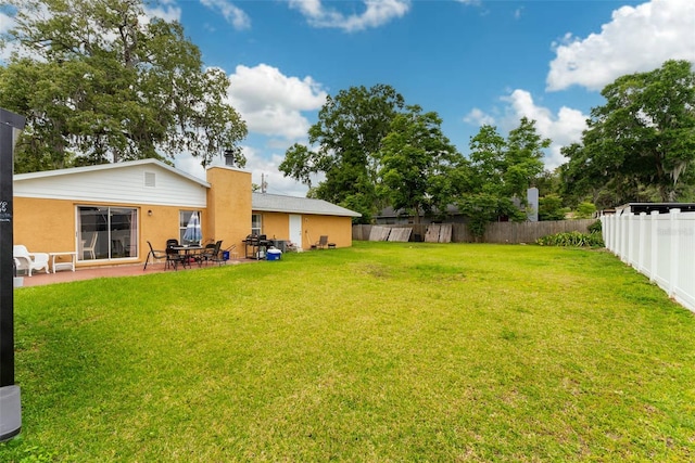 view of yard with a patio area