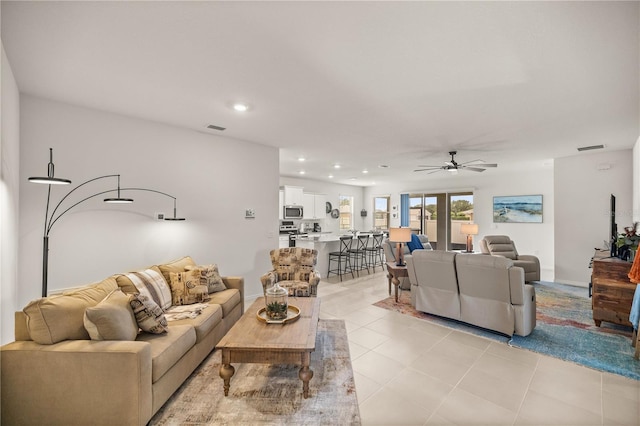 living room featuring ceiling fan