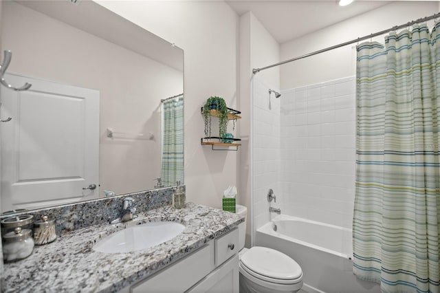 full bathroom with toilet, vanity, and shower / tub combo with curtain