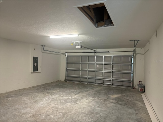 garage featuring a garage door opener and electric panel