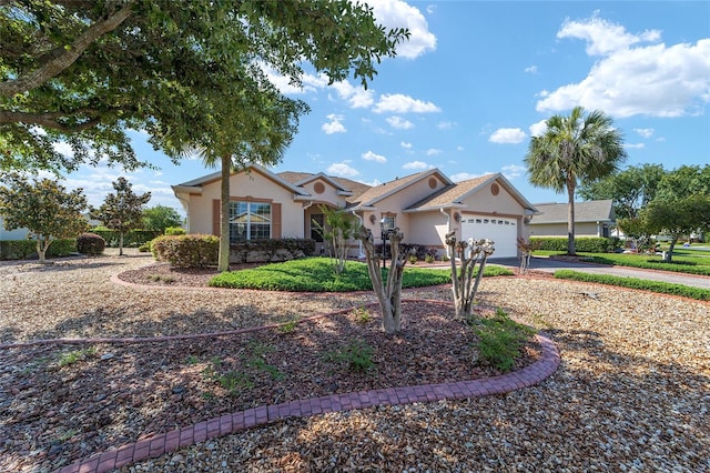 single story home featuring a garage