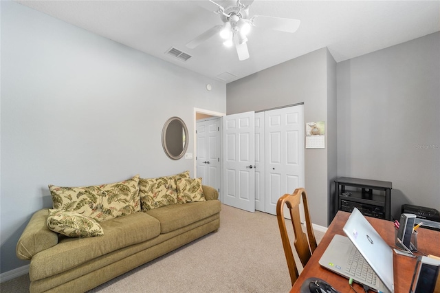 home office with light colored carpet and ceiling fan