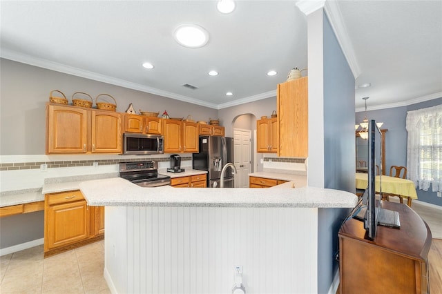 kitchen featuring tasteful backsplash, light tile floors, stainless steel appliances, and crown molding