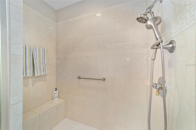 bathroom featuring tiled shower