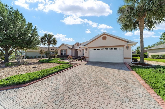 single story home featuring a garage