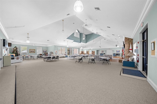 interior space featuring a high ceiling and ornamental molding