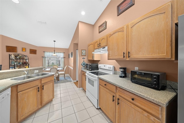 kitchen featuring lofted ceiling, white appliances, sink, hanging light fixtures, and light tile patterned flooring