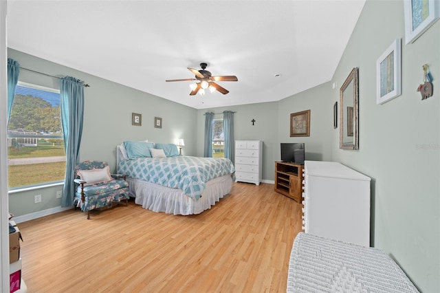 bedroom featuring ceiling fan and light hardwood / wood-style floors