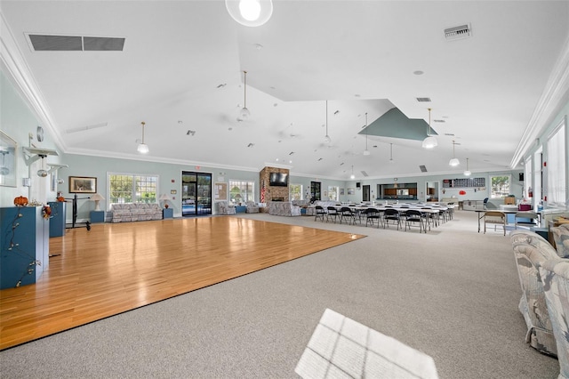 interior space with carpet floors and crown molding