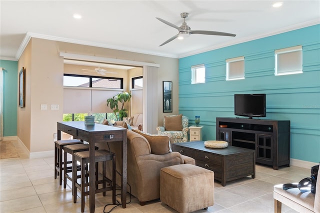 living room with ceiling fan, light tile floors, and ornamental molding