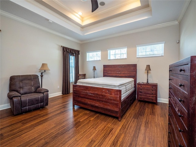 bedroom featuring crown molding, multiple windows, dark hardwood / wood-style floors, and ceiling fan