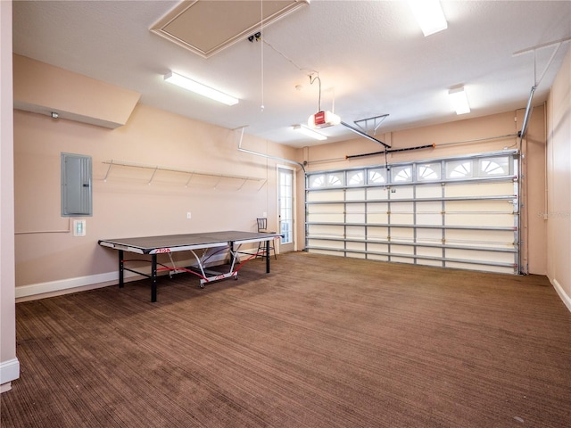 garage featuring a garage door opener and electric panel