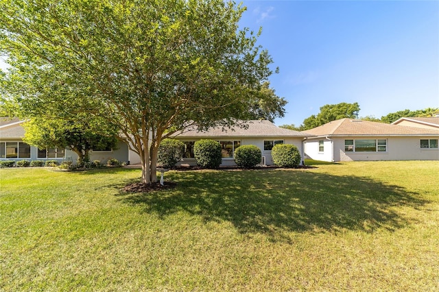 view of front of property with a front lawn