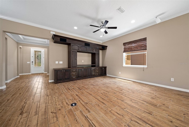 unfurnished living room with ceiling fan, light hardwood / wood-style floors, and ornamental molding