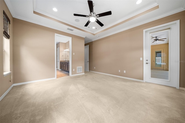 3396 NW 55th Ct, Ocala, FL 34482 - spare room featuring a raised ceiling, ceiling fan, ornamental molding, light colored carpet, and recessed lighting