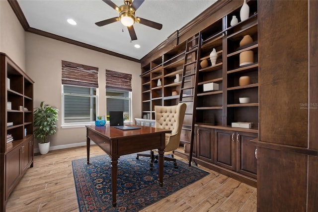 home office with light hardwood / wood-style flooring, ceiling fan, and ornamental molding