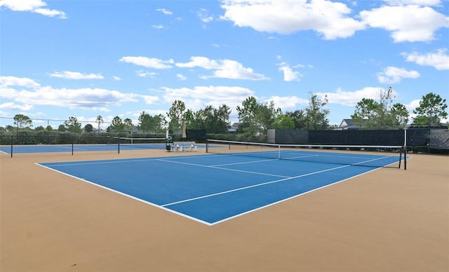 view of tennis court with basketball court