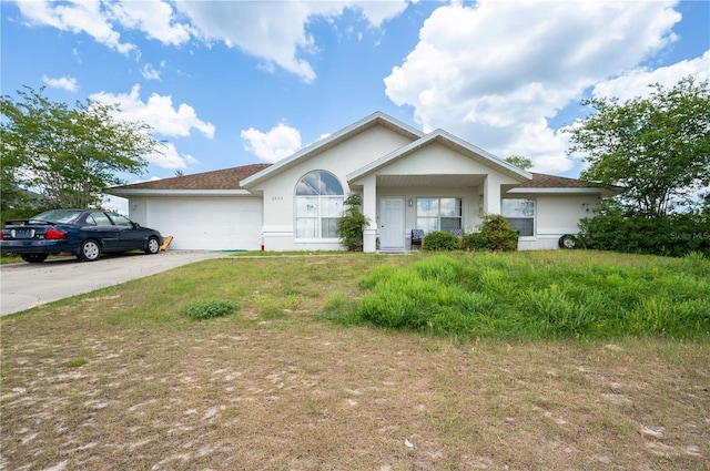 single story home with a garage