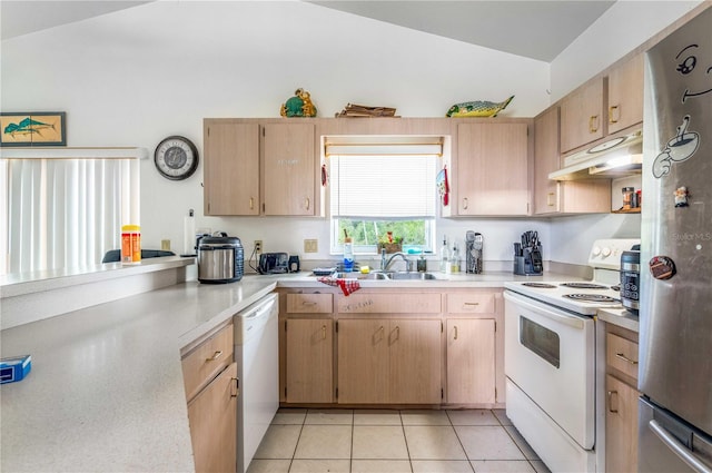 kitchen with light brown cabinets, light tile floors, sink, white appliances, and lofted ceiling