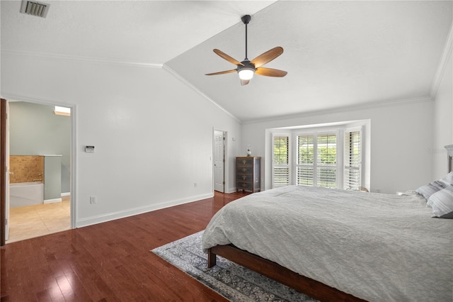 bedroom with ensuite bath, ceiling fan, wood-type flooring, lofted ceiling, and ornamental molding