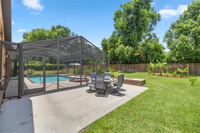 view of patio with a lanai and a fenced in pool