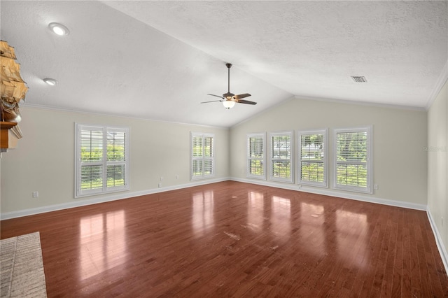 unfurnished living room featuring ceiling fan, dark wood-type flooring, lofted ceiling, and crown molding