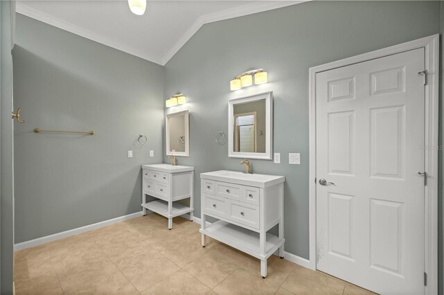 bathroom featuring tile patterned flooring, vanity, lofted ceiling, and ornamental molding