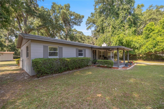 single story home featuring a patio area and a front yard