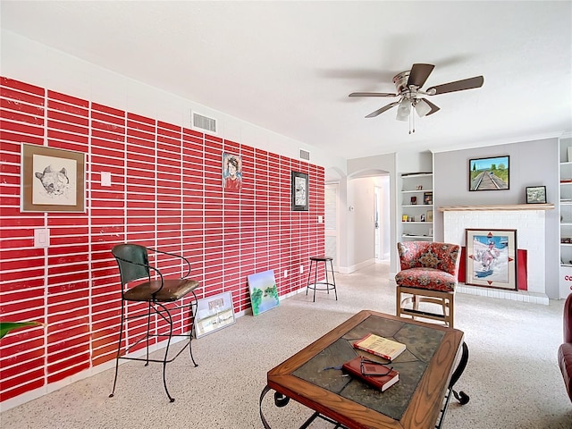 living room featuring ceiling fan