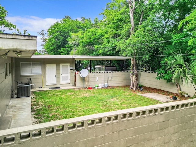 view of yard featuring central AC unit