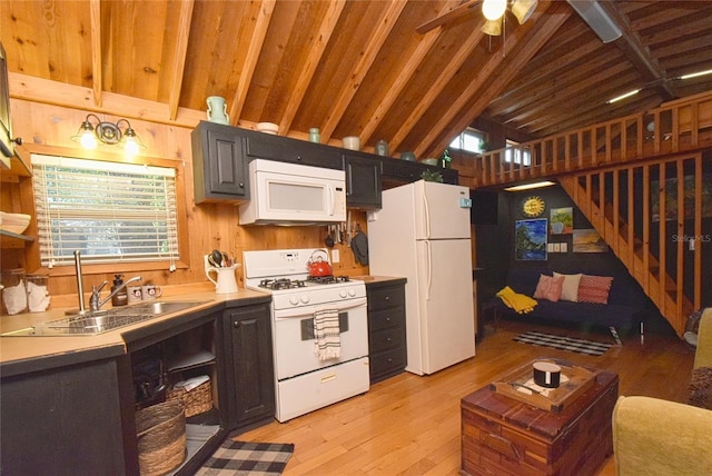 kitchen featuring vaulted ceiling with beams, light hardwood / wood-style flooring, white appliances, sink, and ceiling fan