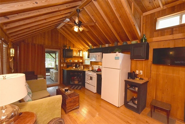 living room with ceiling fan, light wood-type flooring, wood ceiling, beamed ceiling, and wooden walls