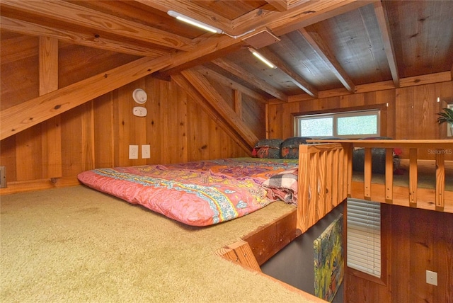 bedroom featuring wooden walls, beam ceiling, and wood ceiling