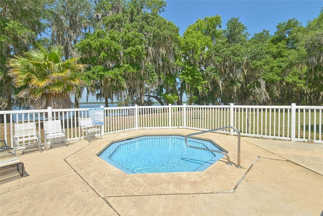 view of pool featuring a patio